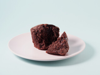 Chocolate cupcakes with cherry jam isolated on a white background. Chocolate muffin. High quality photo