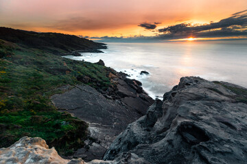 Sunset in the basque coast under Jaizkibel mountain in Hondarribia, Basque Country.