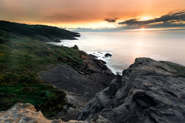 Sunset in the basque coast under Jaizkibel mountain in Hondarribia, Basque Country.