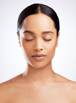 Beauty Grows From Within. Studio Shot Of A Beautiful Young Woman Posing Against A White Background.