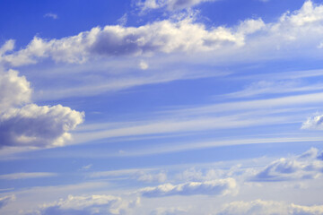 Cloudy sky background on a clear sunny morning