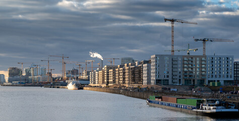 The new district Hafencity during sunset. Picture taken from the Freihafenelbbruecke bridge in Hamburg, Germany.