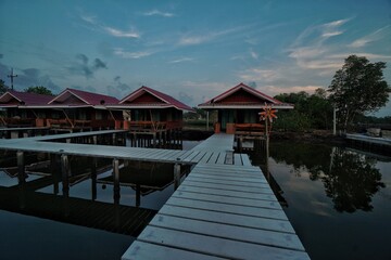 Fototapeta premium wooden bridge over the river