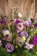 Romantic arrangement of lilac and purple flowers 