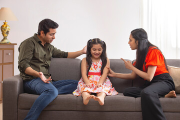 Parent  scolding their daughter for disobedience