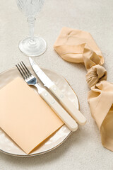 Simple beautiful table setting on light background