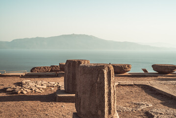 Assos Ancient City ruins with the Aegean Sea and the Lesbos Island in the background. Doric order.