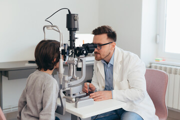 boy has eyesight examination at clinic