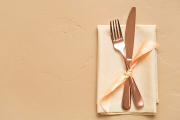 Simple table setting on beige background
