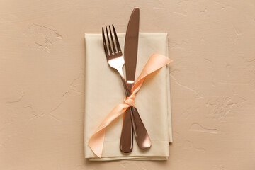 Simple table setting on beige background
