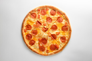 Pizza with peppironi and cheese, on a white background