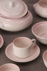 Crockery on a grey textured stone.