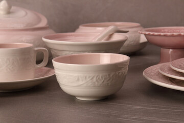 Crockery on a grey textured stone.