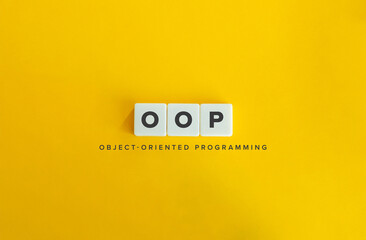 Object-oriented programming (OOP) Banner. Letter Tiles on Yellow Background. Minimal Aesthetics.