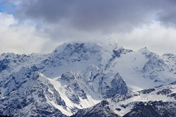 Fototapeta na wymiar Snowy mountains around Arkhyz