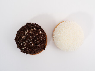 cake with coconut and chocolate chips on a white background.