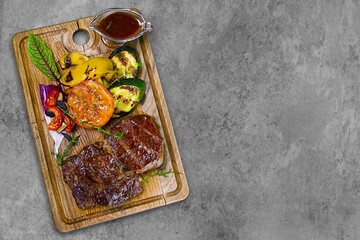 Meat marinated and cooked with sauce. National dish.