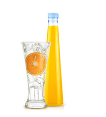 set orange with orange juice bottle in empty glass and ice