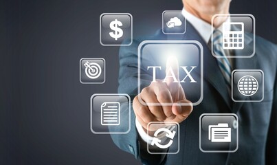 Business hand clicks virtual screen to tax return online, income tax, and property tax.