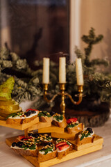 bruschetta with strawberries and arugula. bruschetta with cheese and blueberries and sauce