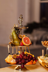 a plate of fruit is on the table