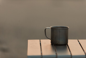 ビーチとコーヒーカップ