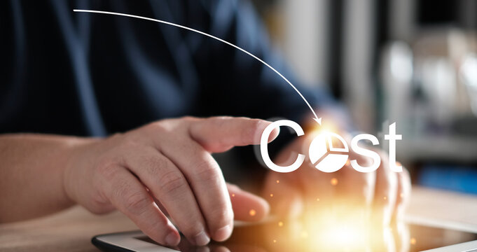 Cost reduction Concept. Businessman with his hand lowers the arrow of the graph. Cost text with a down arrow.