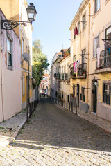 Obraz premium Warm day light in the narrow streets of Lisbon