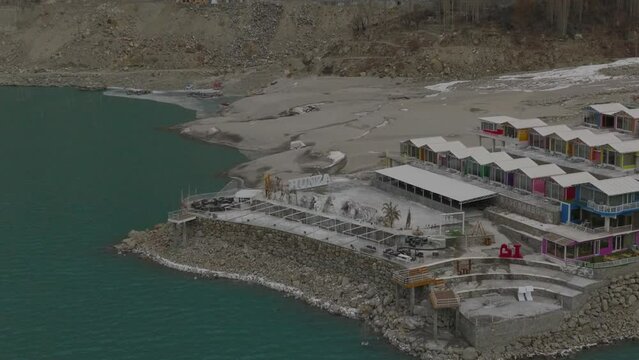 Attabad Lake in Northern Pakistan, formed through a Land Slide in 2010.Very scenic View of turquoise Colour of attabad lake with mountains and KKH Road at Hunza Gilgit Baltistan