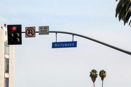 Hollywood boulevard Blvd. sign on a red light traffic light