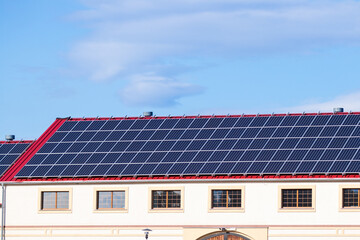 photovoltaic panels on the red roof