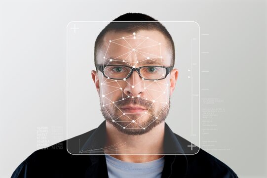 Serious business person and smart technology for face recognition, double exposure. Biometric identification, futuristic cyber security, scanning and facial detection