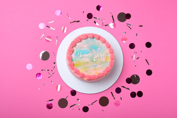 Cute bento cake with tasty cream and confetti on pink background, flat lay