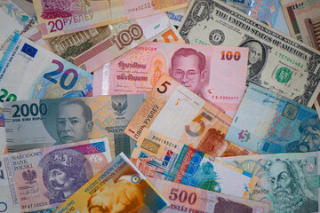 Money of different countries. Paper banknotes of USA, Russia, Indonesia, Thailand, Poland, Czech Republic, Belarus, Switzerland, Kazakhstan, Hungary, Ukraine, Euro