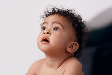 So thats where they keep the cookie jar. Shot of an adorable baby boy at home.