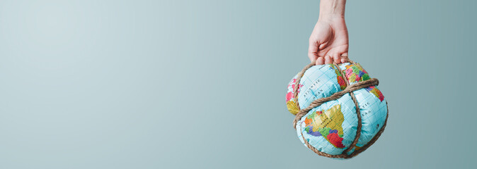 man with a tied earth globe, web banner