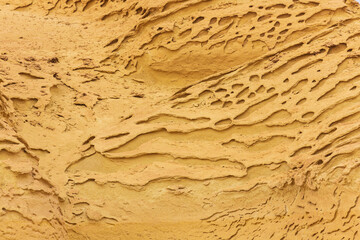 Texture of sandy stones made by erosion in Valley of the Whales or Wadi Al-Hitan. Paleontological...