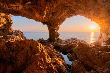 Sunset from a natural arch in Terrasini (Palermo)