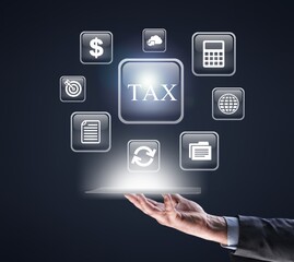 Business hand clicks virtual screen to tax return online, income tax, and property tax.