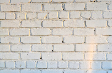 Old white brick wall. Ancient stone texture background. Urban background, white ruined industrial brick wall with copy space. Home and office design backdrop. Vintage effect. 