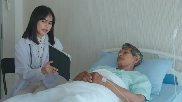 Asian senior male patient is consulting and visiting doctor in hospital..