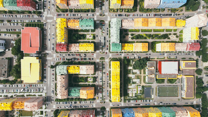 Top view of the courtyards and roads of a residential area with colourful houses