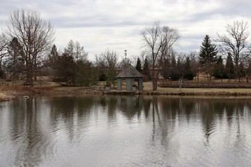 The gazebo at the lake on a cloudy day.