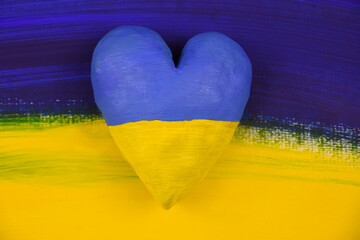 Abstract painted flag of Ukraine with handmade heart stock images. Russian invasion of ukraine...