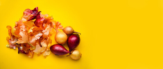 Colorful onion husks on a yellow background. Eco-friendly non-toxic way to paint Easter eggs. Preparing for Easter. Banner