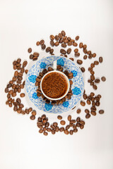 Turkish coffee top view. Isolated on a white background.