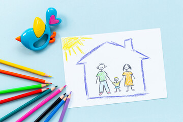 Childs drawing of happy family. Adoption concept