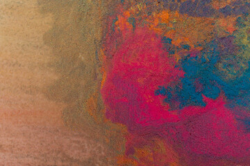 Abstract colorful Happy Holi background. Indian Holi festival of colours. Colorful powder explosion.