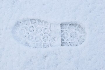 A footprint in the snow
