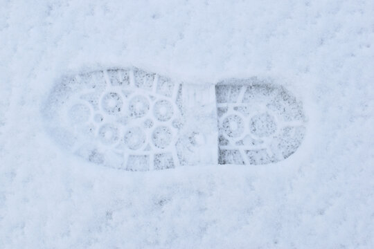 A footprint in the snow